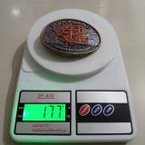 Maryland Constellation Ship vintage belt buckle – on scale showing weight