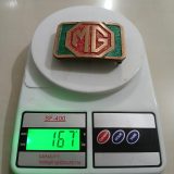 MG vintage belt buckle – on scale showing weight