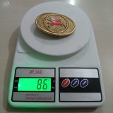 Mobil Pegasus vintage belt buckle – on scale showing weight