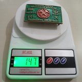 Monongah Division Engineering 1984 vintage belt buckle – on scale showing weight