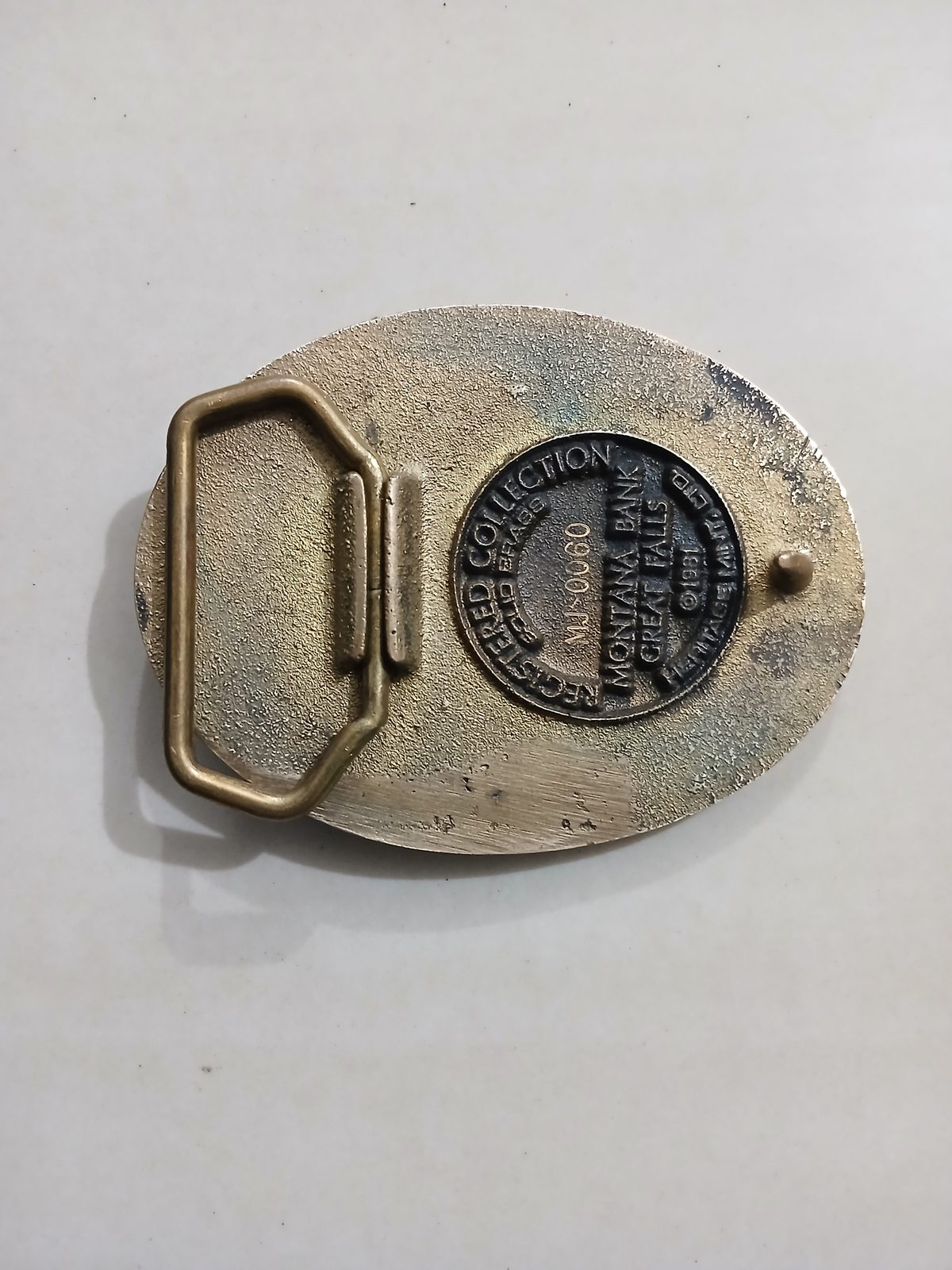 Montana Bank 1881-1981 Vintage Belt Buckle – Back view Montana Bank 1881-1981 vintage belt buckle – back view