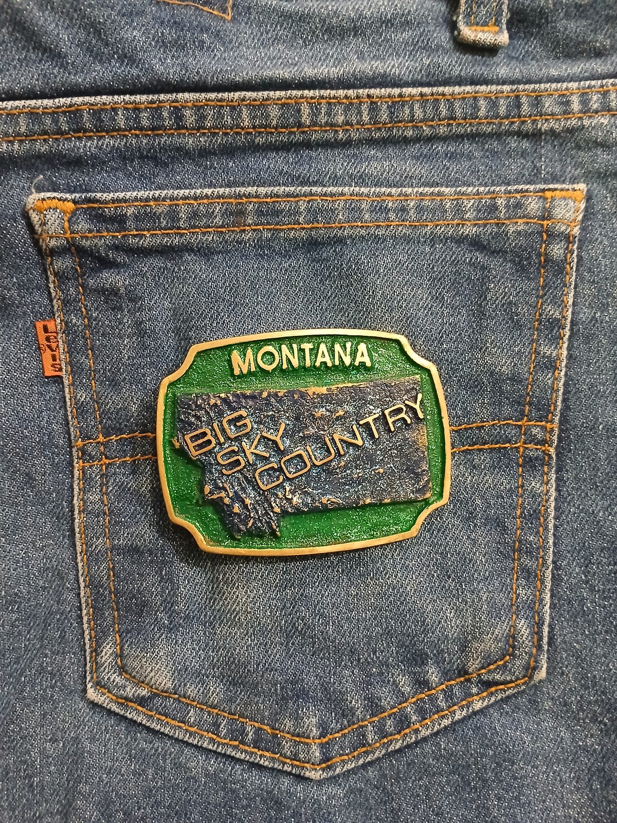 Montana Big Sky Country Vintage Belt Buckle – On jeans back pocket Montana Big Sky Country vintage belt buckle – on jeans back pocket