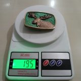 Moose vintage belt buckle – on scale showing weight