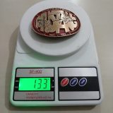 Mustang 1901-1986 vintage belt buckle – on scale showing weight