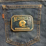 Nebraska Cornhuskers vintage belt buckle – on jeans back pocket