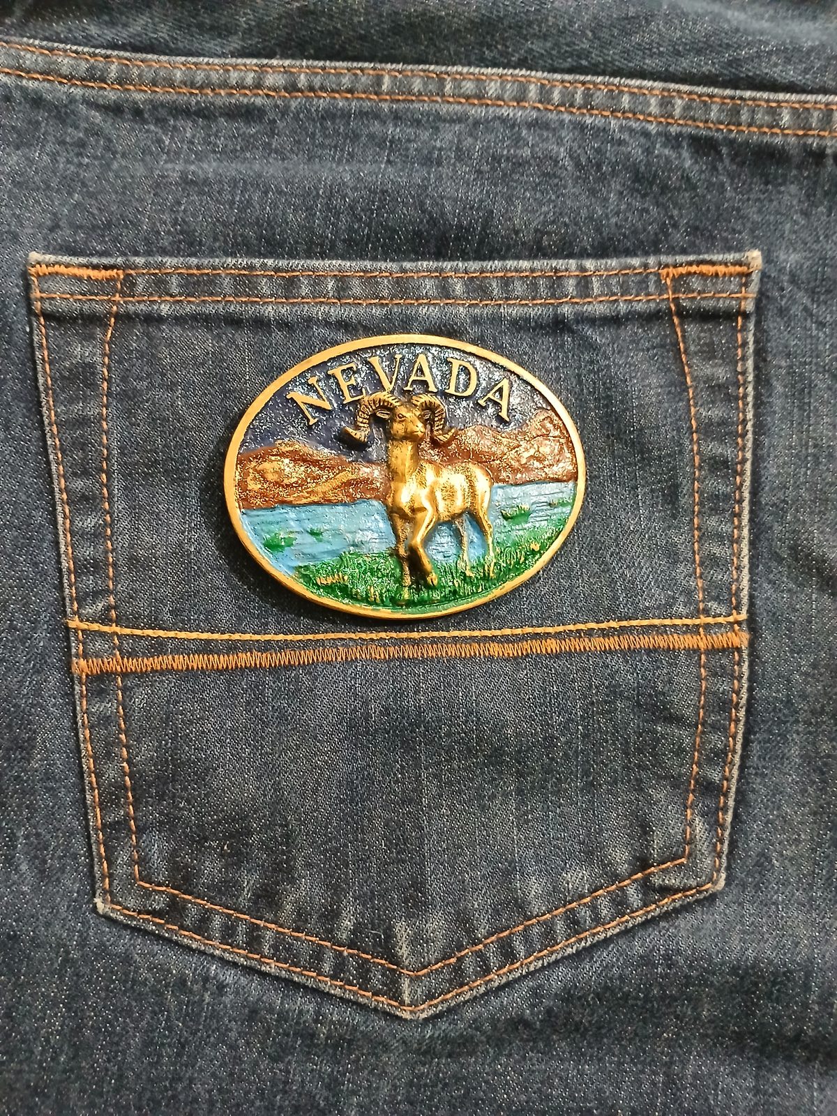 Nevada Bighorn Ram Vintage Belt Buckle – On jeans back pocket Nevada Bighorn Ram vintage belt buckle – on jeans back pocket