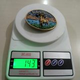 Nevada Bighorn Ram vintage belt buckle – on scale showing weight