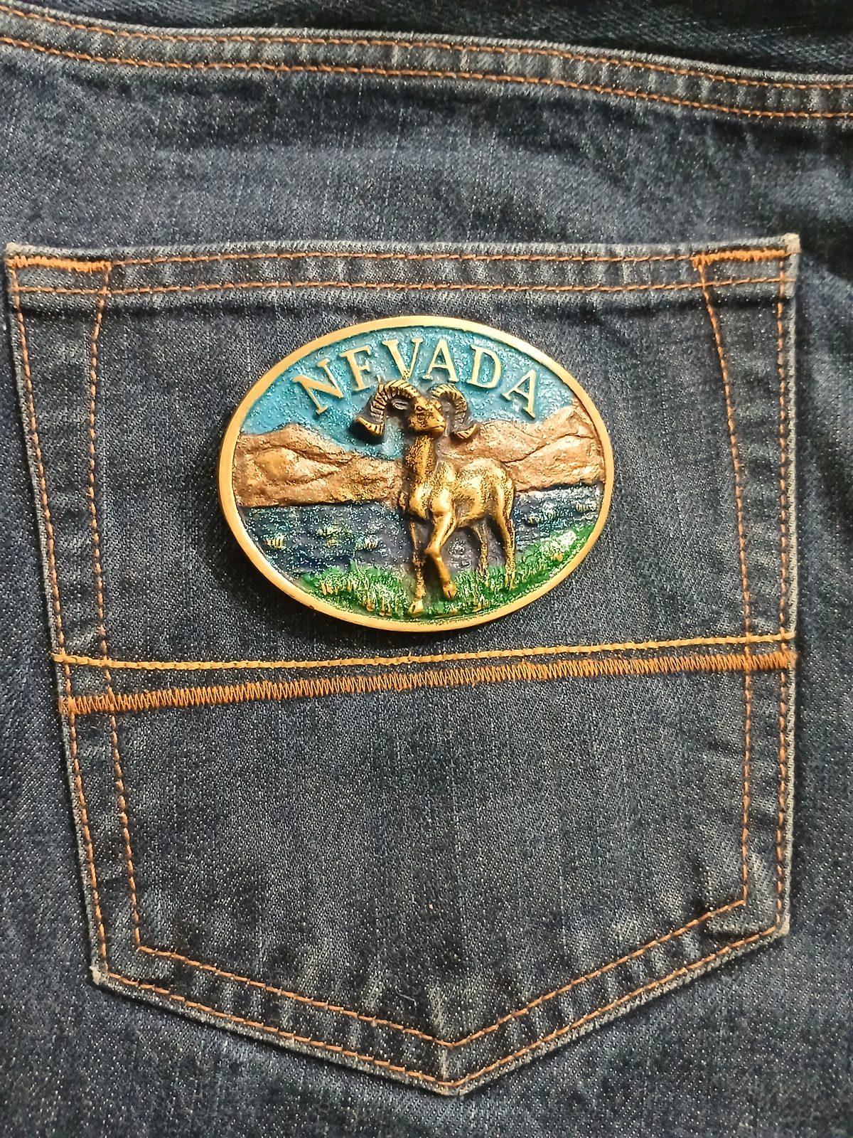 Nevada Bighorn Ram Vintage Belt Buckle – On jeans back pocket Nevada Bighorn Ram vintage belt buckle – on jeans back pocket