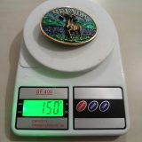 Nevada Bighorn Ram vintage belt buckle – on scale showing weight