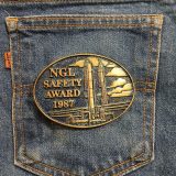 NGL Safety Award 1987 vintage belt buckle – on jeans back pocket