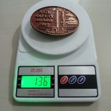 NGL Safety Award 1987 vintage belt buckle – on scale showing weight