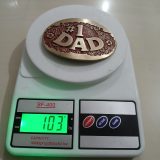 Number 1 Dad vintage belt buckle – on scale showing weight