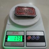 NY Abercrombie Est 1892 Red vintage belt buckle – on scale showing weight