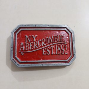 NY Abercrombie Est 1892 Red vintage belt buckle – front view