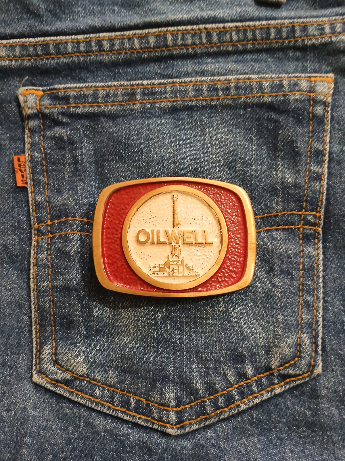 Oilwell Vintage Belt Buckle – On jeans back pocket Oilwell vintage belt buckle – on jeans back pocket