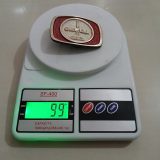 Oilwell vintage belt buckle – on scale showing weight