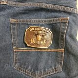 Oklahoma Outlaws vintage belt buckle – on jeans back pocket