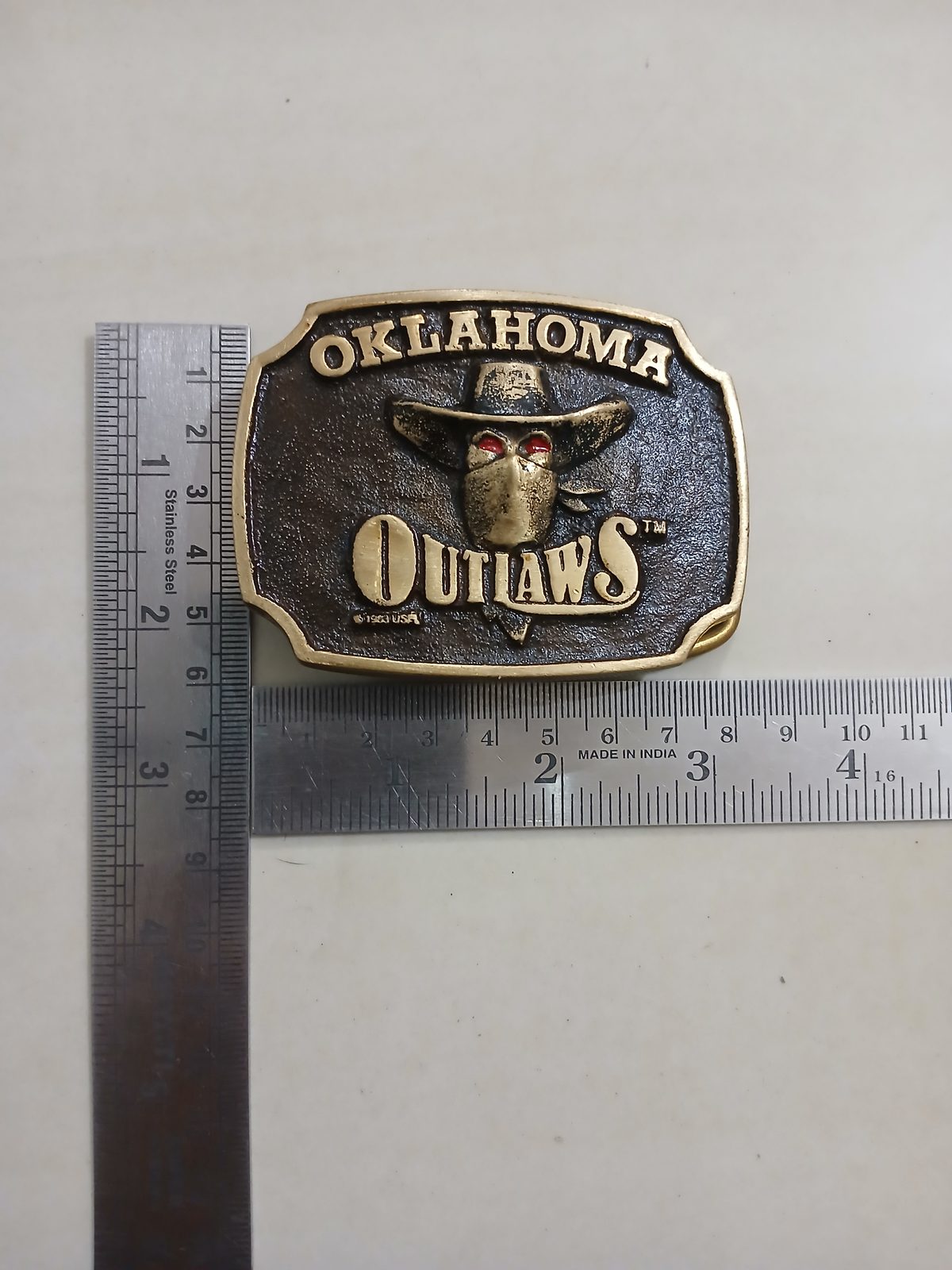 Oklahoma Outlaws Vintage Belt Buckle – With ruler for size Oklahoma Outlaws vintage belt buckle – with ruler for size