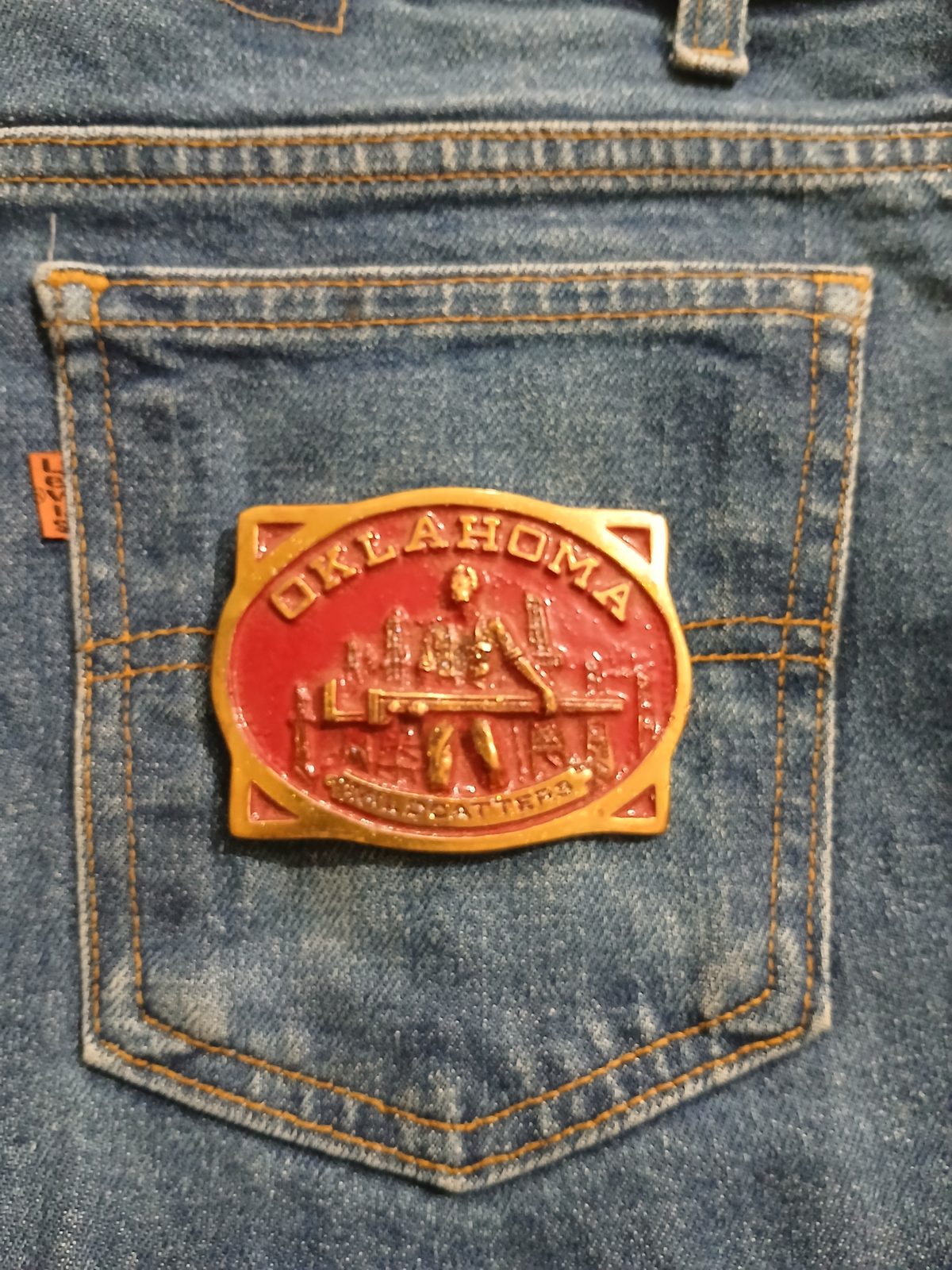 Oklahoma Wildcatters Vintage Belt Buckle – On jeans back pocket Oklahoma Wildcatters vintage belt buckle – on jeans back pocket