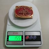 Oklahoma Wildcatters vintage belt buckle – on scale showing weight