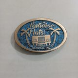Paradise Flats Well Service Inc vintage belt buckle – front view