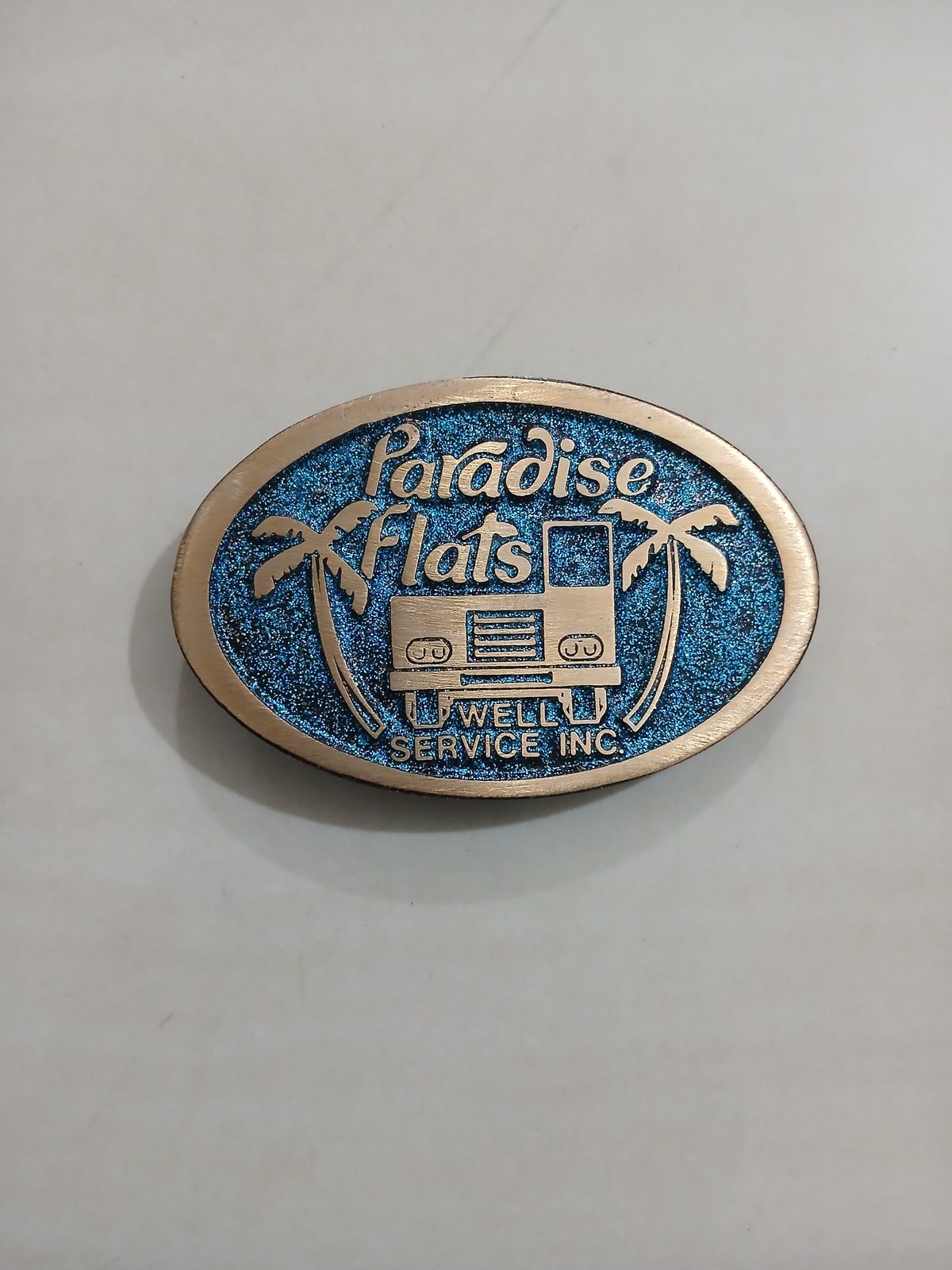 Paradise Flats Well Service Inc Vintage Belt Buckle – Front view Paradise Flats Well Service Inc vintage belt buckle – front view