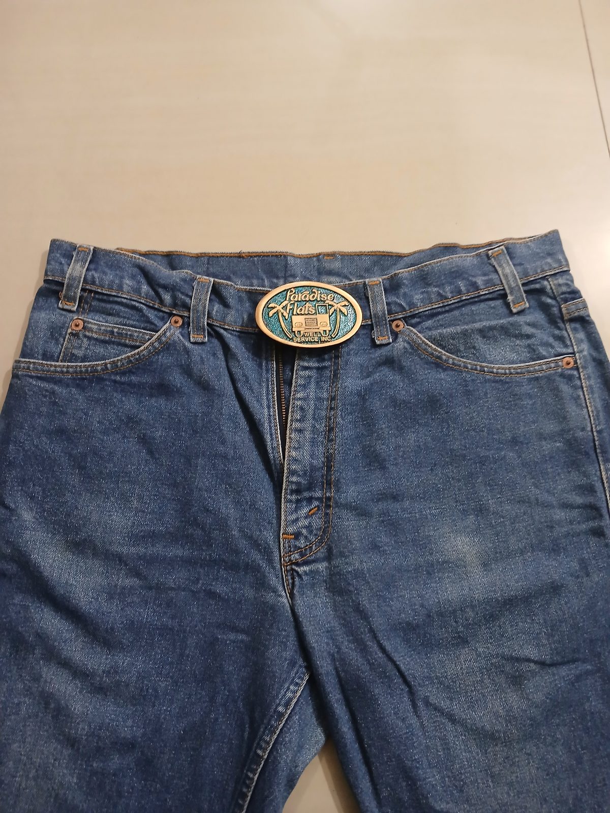 Paradise Flats Well Service Inc Vintage Belt Buckle – Worn on belt with jeans Paradise Flats Well Service Inc vintage belt buckle – worn on belt with jeans