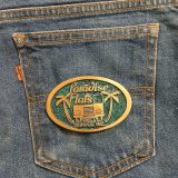 Paradise Flats Well Service Inc vintage belt buckle – on jeans back pocket