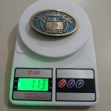 Paradise Flats Well Service Inc vintage belt buckle – on scale showing weight