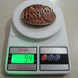 Pennsylvania Keystone State vintage belt buckle – on scale showing weight