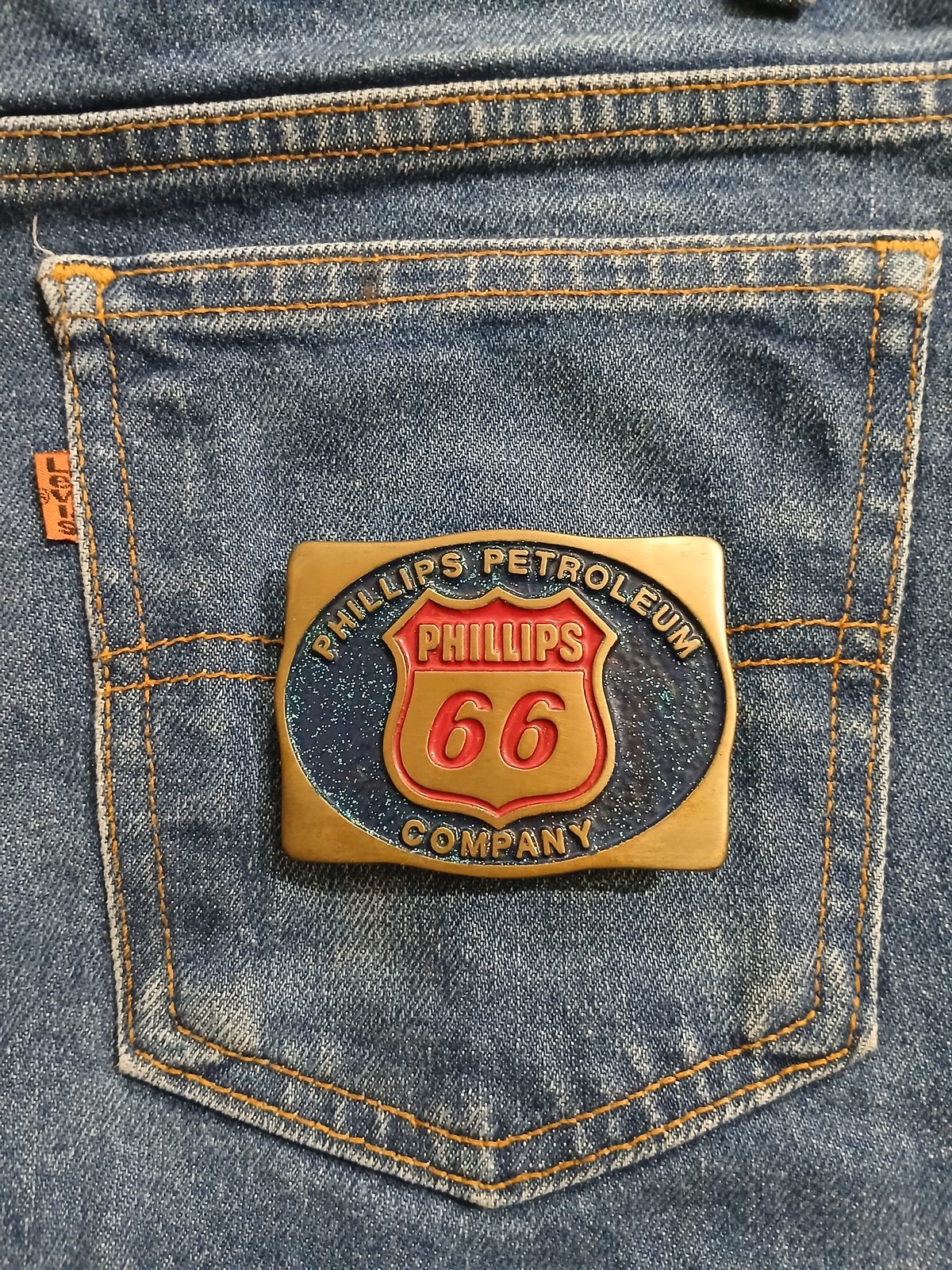 Phillips 66 Petroleum Vintage Belt Buckle – On jeans back pocket Phillips 66 Petroleum vintage belt buckle – on jeans back pocket