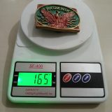 Phoenix vintage belt buckle – on scale showing weight