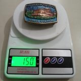 Power Station vintage belt buckle – on scale showing weight