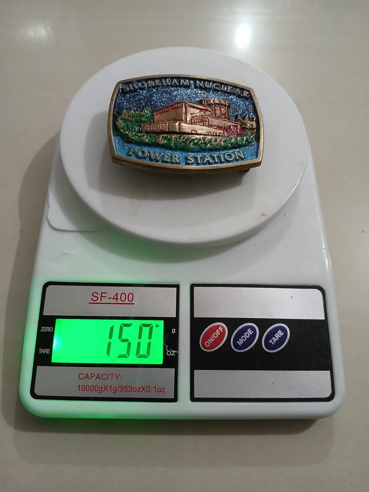 Power Station Vintage Belt Buckle – On scale showing weight Power Station vintage belt buckle – on scale showing weight