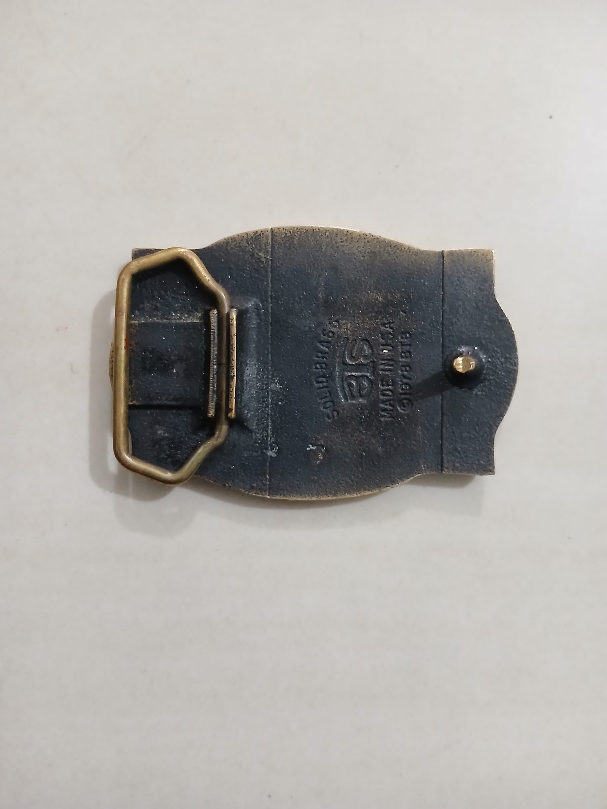 Printing Press 1882-1982 Vintage Belt Buckle – Back view Printing Press 1882-1982 vintage belt buckle – back view