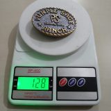 Purple Sage Ranch Bandera Texas vintage belt buckle – on scale showing weight