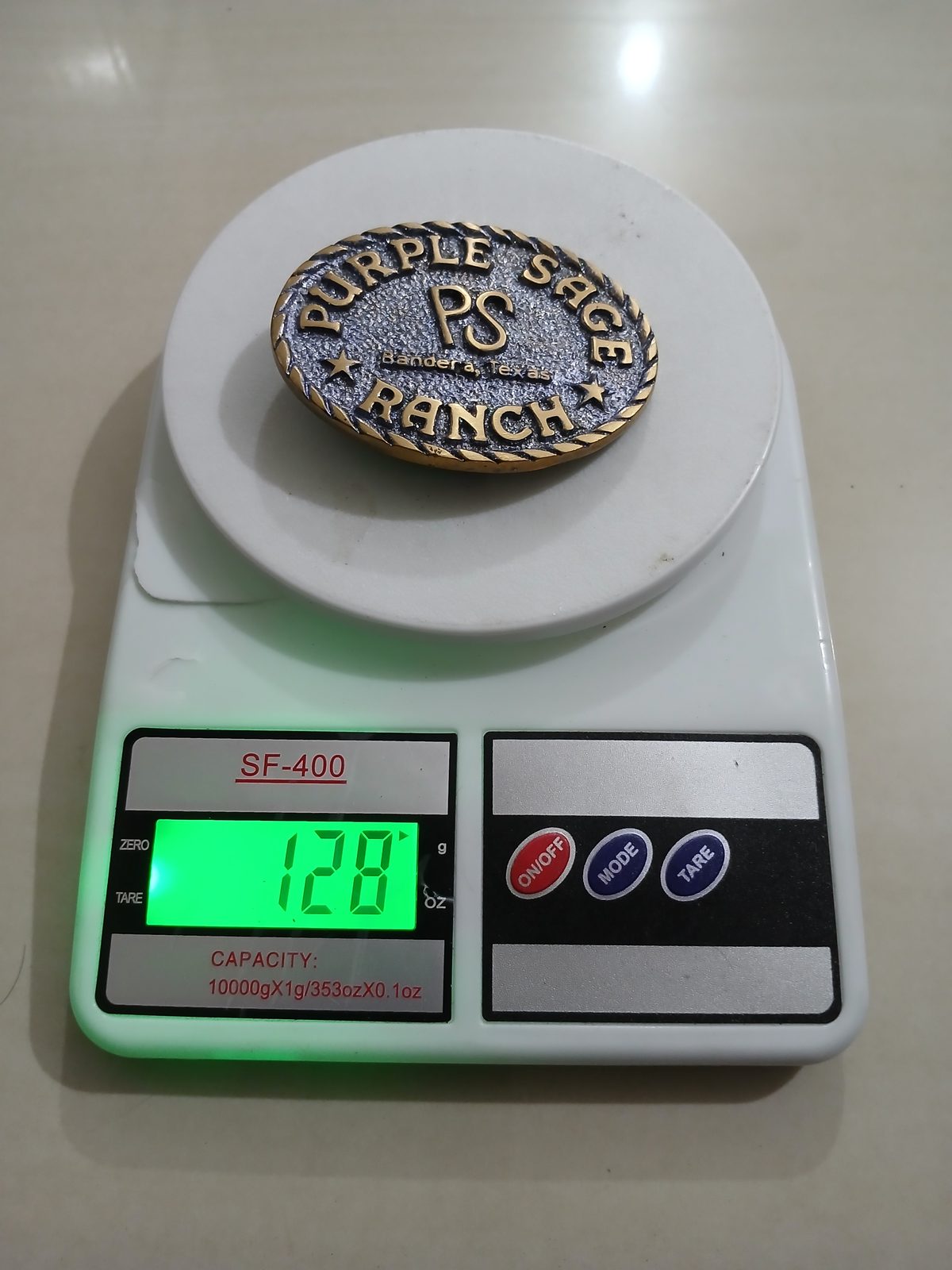 Purple Sage Ranch Bandera Texas Vintage Belt Buckle – On scale showing weight Purple Sage Ranch Bandera Texas vintage belt buckle – on scale showing weight