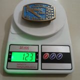 Reno Air Races 1996 vintage belt buckle – on scale showing weight