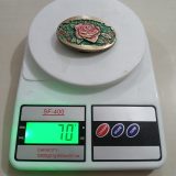 Rose vintage belt buckle – on scale showing weight