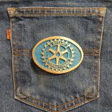 Rotary International vintage belt buckle – on jeans back pocket