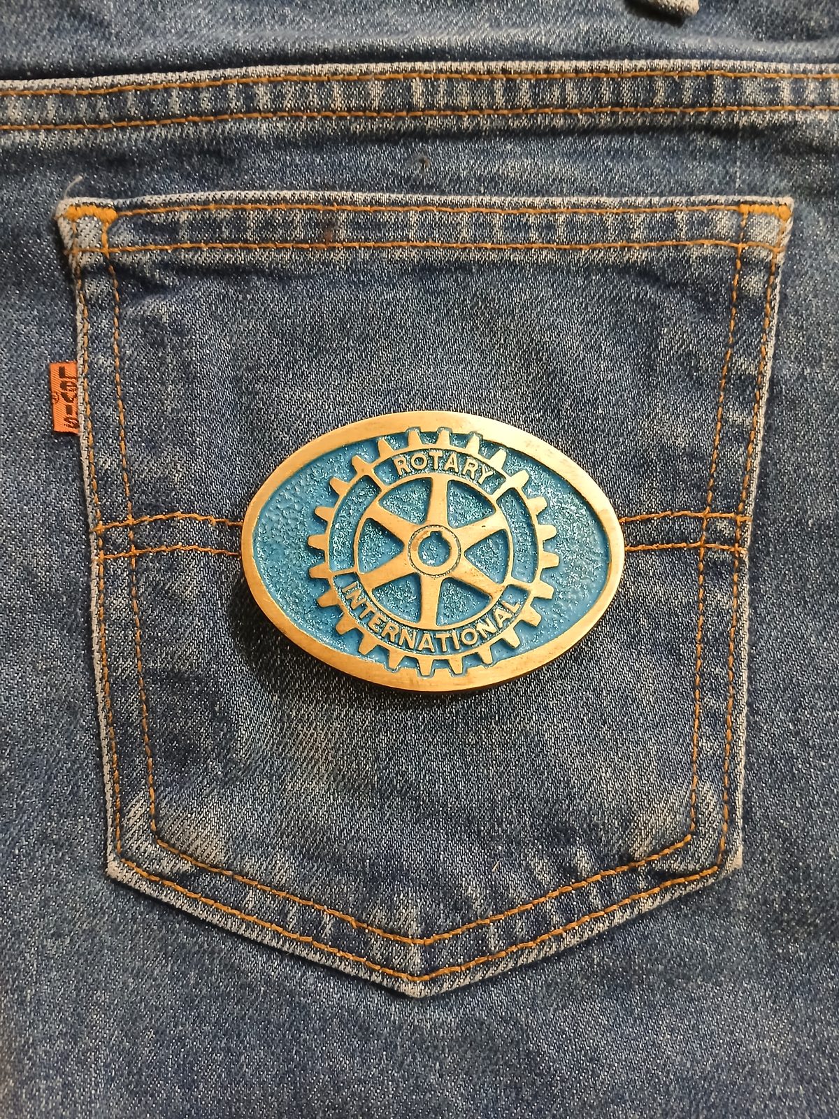 Rotary International Vintage Belt Buckle – On jeans back pocket Rotary International vintage belt buckle – on jeans back pocket