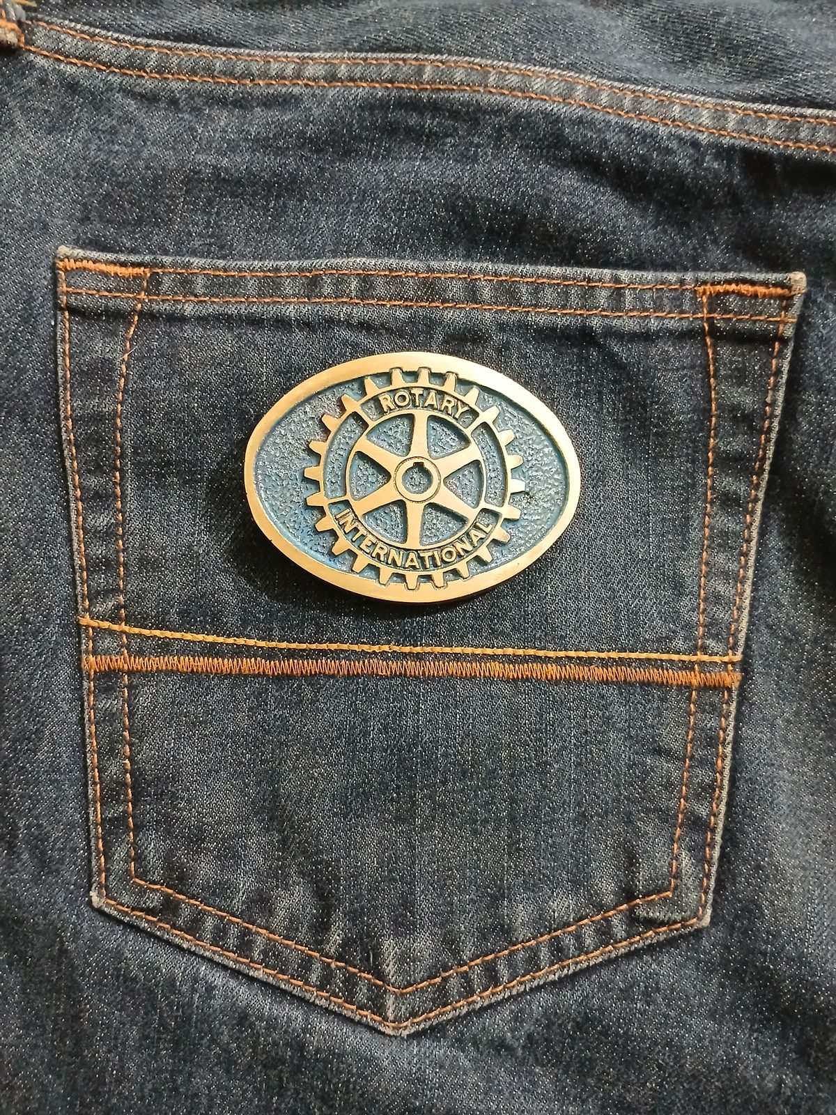 Rotary International Vintage Belt Buckle – On jeans back pocket Rotary International vintage belt buckle – on jeans back pocket