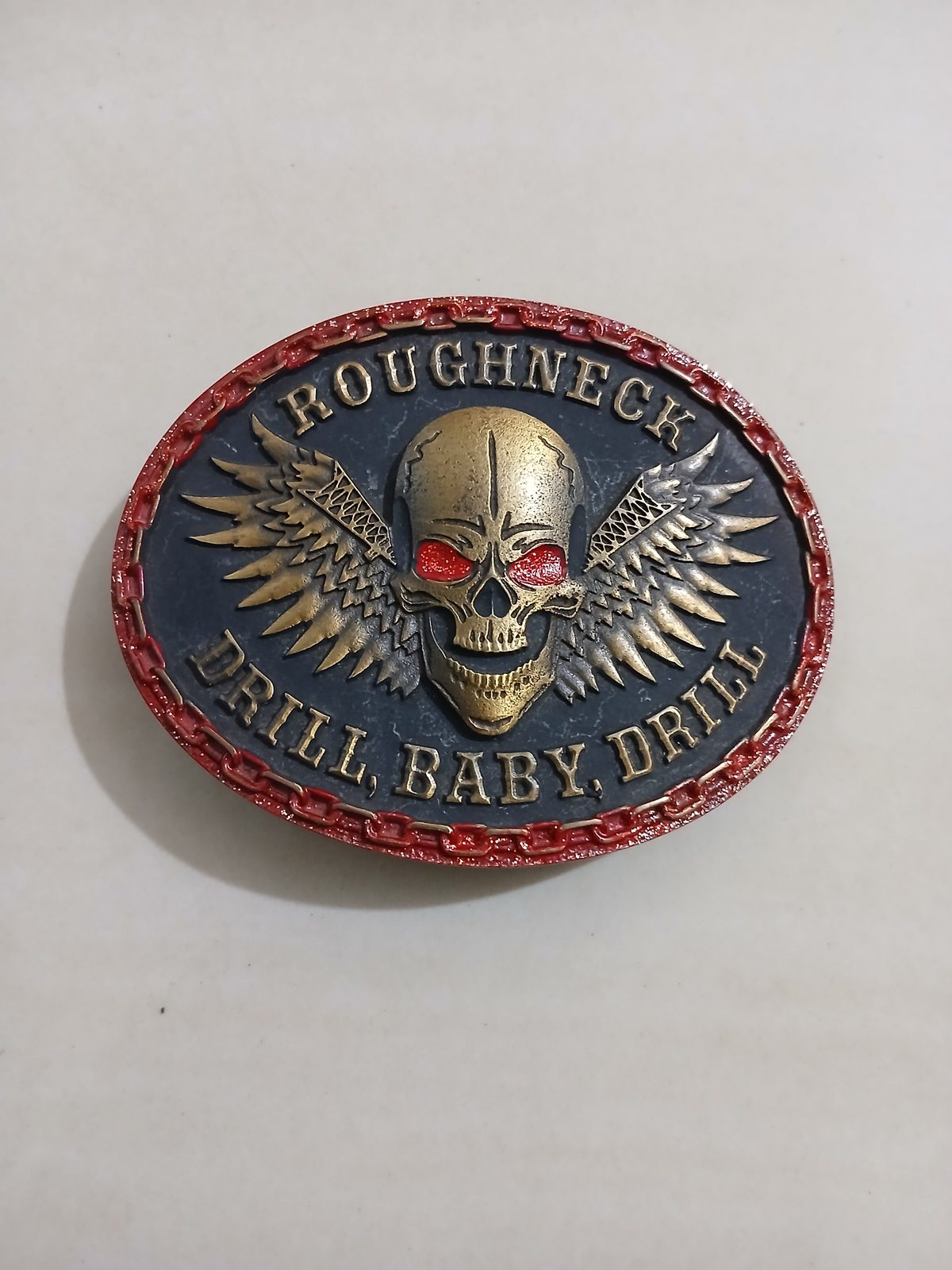 Roughneck Drill Baby Drill Vintage Belt Buckle – Front view Roughneck Drill Baby Drill vintage belt buckle – front view