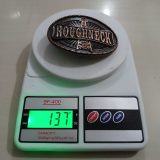 Roughneck Oil Derrick vintage belt buckle – on scale showing weight