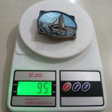 Sailboat vintage belt buckle – on scale showing weight