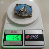 Sailboat vintage belt buckle – on scale showing weight