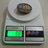 Sailing Ship vintage belt buckle – on scale showing weight