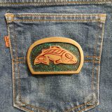 Salmon vintage belt buckle – on jeans back pocket