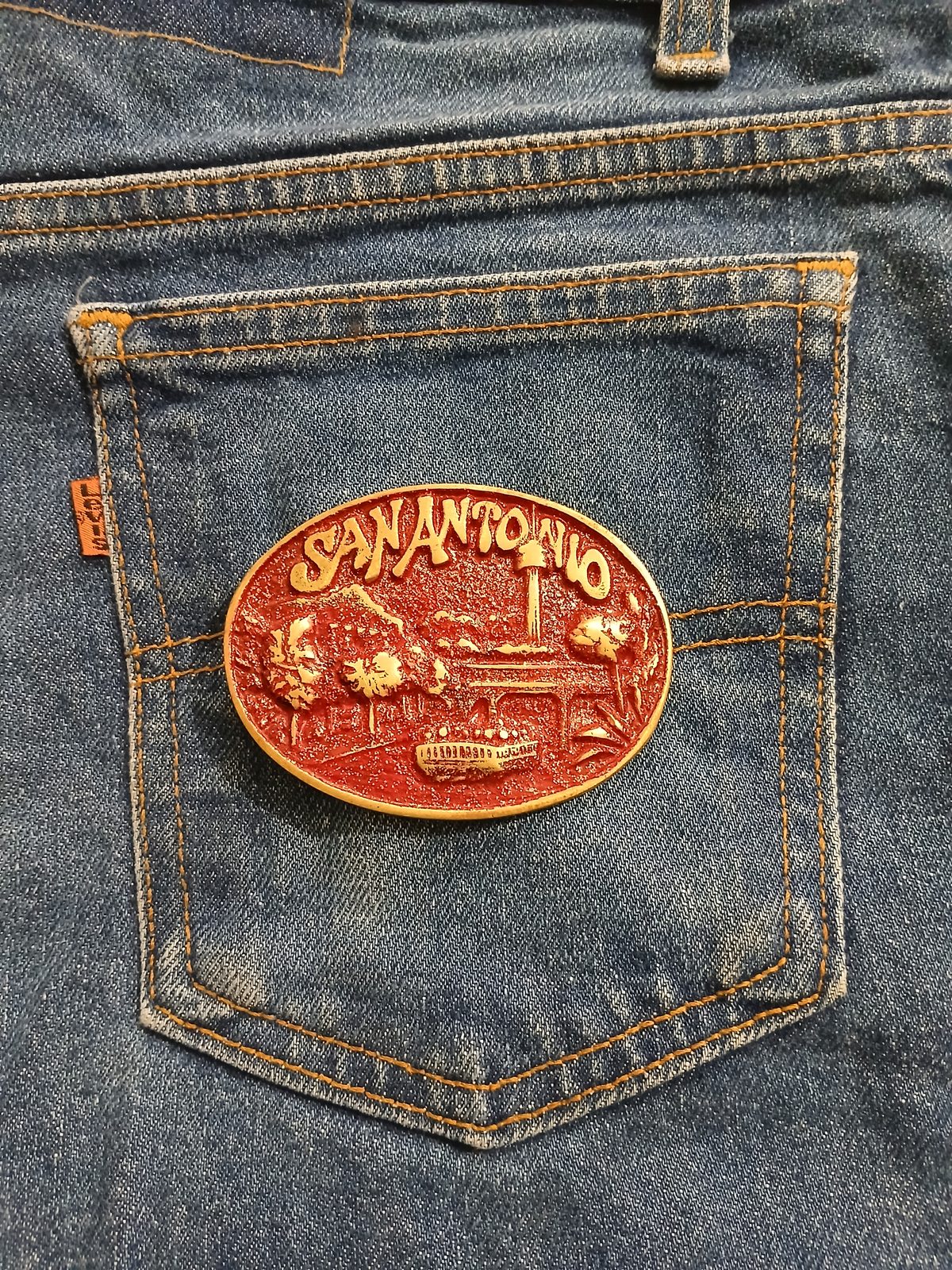 San Antonio Riverwalk Vintage Belt Buckle – On jeans back pocket San Antonio Riverwalk vintage belt buckle – on jeans back pocket