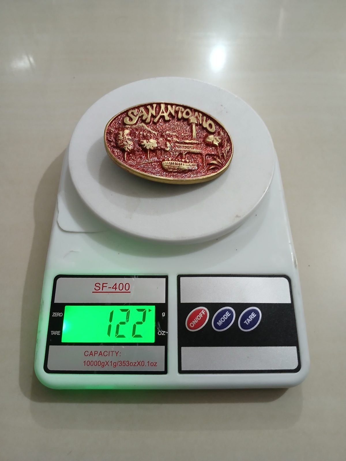 San Antonio Riverwalk Vintage Belt Buckle – On scale showing weight San Antonio Riverwalk vintage belt buckle – on scale showing weight